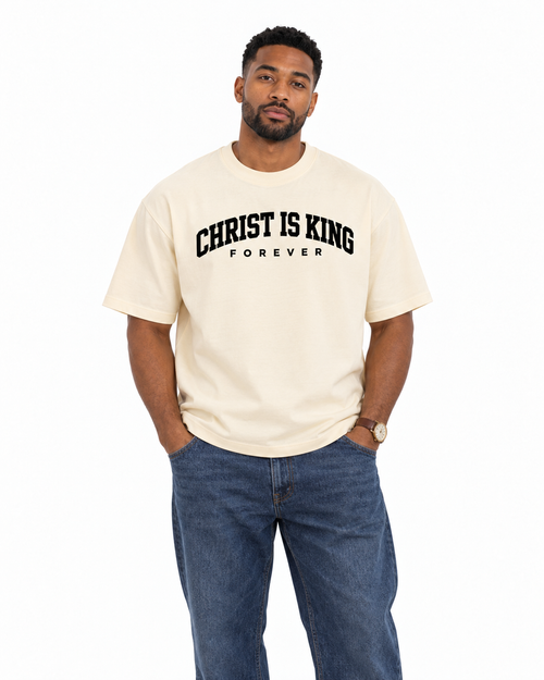 Chief Of Sinners Christ Is King Drop Shoulder Tee Cream — Milk Apricot tee, male close-up
